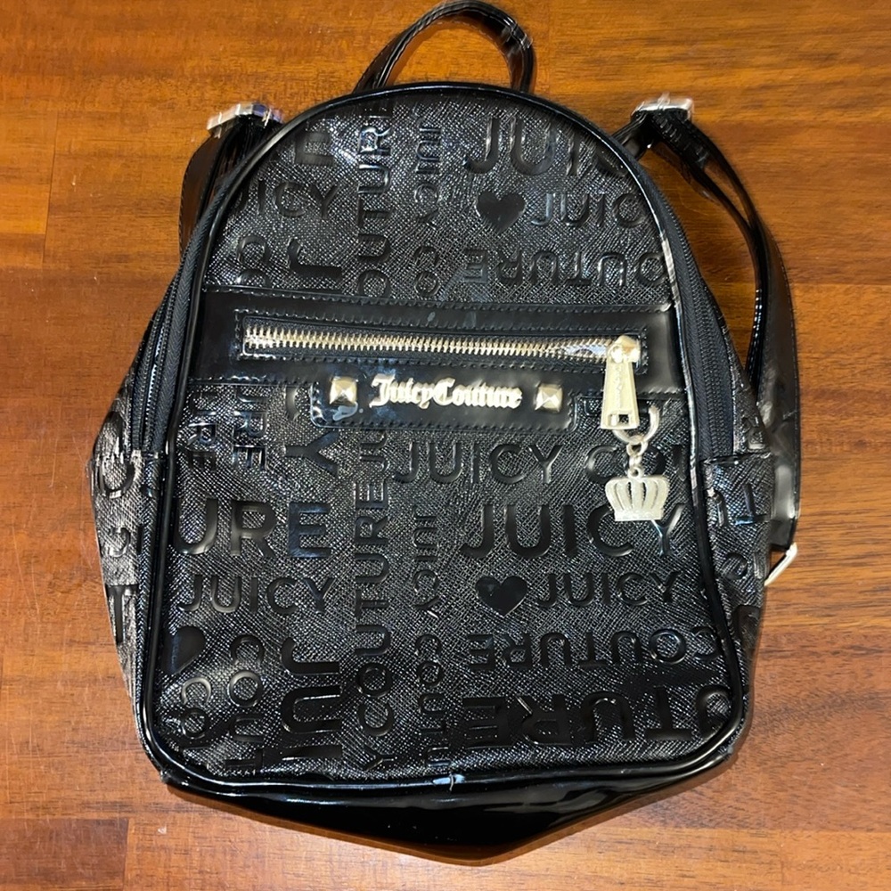 Juicy Couture Black Monogram Backpack Purse.